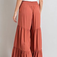 Our Taylor Tiered Pants will make you feel like a boho goddess! These comfy, flowy pants feature wide legs and tiers that flutter and dance as you move. Step out in style; you won't want to take them off!Model is 5'8" wearing a size small 100% rayon - Non-stretch fabric