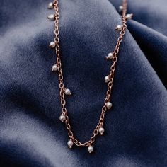 Add some sparkle to your seaside look with the Hanging Pearl Beaded Choker. This super-elegant design features a delicate silver or rose gold chain, accentuated with glimmering pearls to add some sparkle to your style! Silver: Brass base with silver plating & synthetic pearls- Rose Gold: Brass base with rose gold plating & synthetic pearls- Chain: 14" with 3" extention. Jump ring at 1" and 2" of extension.- Pearls: 2mm diameter Rose Gold Chain Women, Pura Vida Necklace, Gold Chain Women, Pearl Rose, Bead Choker, Chain Women, Pearls Necklace, Rose Gold Chain, Pearl Hoop Earrings