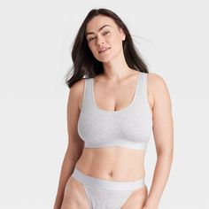 Stay comfortable and stylish at home or when running errands in this Cotton Stretch Unlined Scoop Bralette from Auden™. The jersey pullover bralette is made of a cotton-blend fabric with added spandex for a flexible fit that moves with you, while the full lining provides extra coverage. The fashionably simple bralette features wireless unlined cups for added comfort and a sleek, smooth look. Auden™: Fit for you in every way. Casual Everyday Cotton Sports Bra, Casual Cotton Seamless Bra, Cotton Sports Bra With Light Support For Loungewear, Stretch Cotton Seamless Bra, Cotton Stretch Seamless Bra, Seamless Stretch Cotton Bra, Cotton Seamless Stretch Bra, Casual Cotton Bra For Loungewear, Medium Support Cotton Crop Top For Loungewear