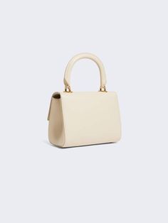 [vc_row][vc_column width=”1/3″][vc_column_text text_larger=”no”] Schiaparelli Schiaparelli Mini Secret Bag A bag crafted from smooth ecru lambskin. It is secured with a Beige Satchel With Adjustable Handle For Evening, High-end Cream Shoulder Bag For Evening, Timeless Cream Satchel For Formal Use, Elegant Satchel With Gold-tone Hardware And Round Handle, Beige Top Handle Shoulder Bag With Pearl Handle, Cream Evening Bag With Detachable Handle, Elegant Beige Satchel With Adjustable Handle, Beige Evening Bag With Top Carry Handle, Timeless Cream Satchel With Top Handle