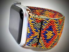 This Apple Watch Band is handmade, we use incredibly comfortable elastic material. Enjoy the comfort and security of these stretchy bands, they are soft to the touch and can be custom fitted to your specific wrist measurement. We handcraft each band to fit each customer's measurements. All of our bands come with the most secure adapters that can be custom-selected to match your watch. STRAP SPECIFICATIONS * Available for all types of Apple Watches including Series 1 - 6 and SE models and spannin Modern Adjustable Multicolor Watch Accessories, Modern Multicolor Adjustable Watch Accessories, Modern Adjustable Multicolor Watch Bands, Casual Multicolor Apple Watch Band As Gift, Modern Multicolor Apple Watch Band, Modern Multicolor Rectangular Apple Watch Band, Multicolor Adjustable Casual Watch Bands, Green Casual Adjustable Apple Watch Band, Casual Adjustable Green Apple Watch Band