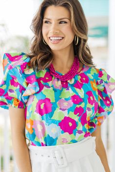 This bold blouse is just what you need this summer! Those hues are so vibrant and we love the cute ruffled sleeves! This blouse is perfect for taking you from work to dinner! Round neckline Short ruffled sleeves Vibrant floral print No... Blue Floral Blouse, Mint Julep Boutique, Trendy Boutique, Scarf Sale, Cute Boutiques, Boutique Tops, Mint Julep, Ruffled Sleeves, Model Fits