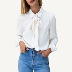 - Viscose rayon/crepe - Removable tie sash - Set in puff shoulder - Full button front closure - Full length sleeves with button closure at wrist - Model is wearing a size small - Dry clean - Made in NYC Emerson Fry, Viscose Rayon, Full Length, Length Sleeve, Top Blouse, How To Wear, Clothes