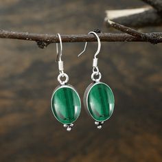 Natural Malachite Gemstone 925 Sterling Silver Earring Jewelry. Earring made by Natural Malachite Gemstone with pure 925 sterling silver. The unique design jewelry Earring has been fashioned out of 925 sterling silver and promises to be comfortable wear at all times. This Jewelry can be a perfect gift for your loved ones and one of a kind design makes this thing perfect for engagement gift, wedding gift, marriage anniversary gift and birthday gift. We accept customization, contact us For Custom May Birthstone Sterling Silver Gemstones, Green Sterling Silver Jewelry With Polished Finish, Oval Malachite Gemstone Jewelry, Green Spiritual Jewelry With Polished Finish, Malachite Round Gemstone Jewelry, Silver Round Malachite Jewelry, Green Polished Sterling Silver Gemstones, Green Sterling Silver Gemstones With Polished Finish, Green Onyx Round Gemstone Jewelry