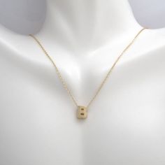 This pendant necklace is crafted in 14 Karat yellow gold. Featuring the letter "B" on a adjustable necklace measuring 16 or 18 inches in length. B Initial, The Letter B, Initial Pendant Necklace, Letter B, Initial Pendant, Adjustable Necklace, Initial Necklace, Initials, Yellow Gold