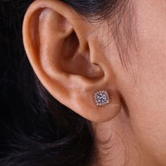 Experience the dazzling brilliance of our Round Lab Grown Diamond Stud Earrings. Expertly set in an elegant rose gold halo setting, these screw back earrings are sustainable, ethical, and exquisitely beautiful. Perfect for adding a touch of sparkle to everyday wear or making a statement at special events. Discover the luxury of lab grown diamonds today. "𝐓𝐨𝐠𝐞𝐭𝐡𝐞𝐫 𝐰𝐞 𝐜𝐚𝐧 𝐦𝐚𝐤𝐞 𝐭𝐡𝐞 𝐰𝐨𝐫𝐥𝐝 𝐚 𝐛𝐞𝐭𝐭𝐞𝐫 𝐩𝐥𝐚𝐜𝐞 𝐟𝐨𝐫 𝐥𝐢𝐯𝐢𝐧𝐠, 𝐥𝐞𝐭’𝐬 𝐠𝐨 𝐰𝐢𝐭𝐡 𝐦𝐢𝐧𝐢𝐧𝐠-𝐟 Halo Round Cut Lab Grown Diamond Earrings, Round Lab-grown Diamond Halo Earrings, Dazzling Round Cut Lab Grown Diamond Earrings, Rose Gold Round Halo Diamond Earrings, Halo Cubic Zirconia Round-cut Earrings, Diamond Halo Earrings, Halo Diamond Earrings, Rose Gold Halo, Diamond City