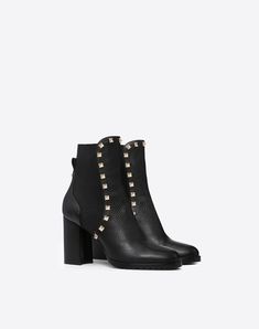 Suede Rockstud Bootie 90mm for Woman | Valentino Online Boutique Studded Ankle Heeled Boots For Winter, Luxury Studded Heeled Boots, Luxury Studded High Heel Boots, Elegant Spiked Ankle Boots, Studded Evening Heeled Boots For Fall, Studded Heeled Boots For Evening In Fall, Luxury Fall Chelsea Boots With Reinforced Heel, Luxury Calf Leather Chelsea Boots For Winter, Luxury Chelsea Boots With Reinforced Heel For Fall