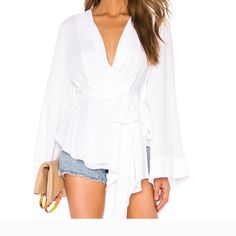 Questions? Leave A Comment Below! Spring Evening Wrap Blouse, Elegant Wrap Top For Spring, White V-neck Top For Date Night, Chic Evening Wrap Top, Fitted Wrap Top For Brunch, White Wrap Blouse For Work, White Wrap Blouse For Workwear, Elegant Wrap Top For Date Night, White Long Sleeve Top For Date Night