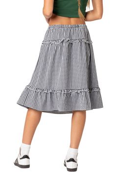 Romantic ruffles and a gingham pattern bring all the sweetness to a tiered midi skirt topped with an adjustable drawstring waistband. 45% polyester, 45% rayon, 10% spandex Machine wash, dry flat Imported Casual Gingham Gathered Skirt, Spring Gingham Gathered Skirt Bottoms, Gingham Gathered Skirt Bottoms For Spring, Gingham Gathered Skirt For Spring, Gingham Ruffled Tiered Skirt, Casual Gingham Skirt With Ruffles, Spring Picnic Skirt With Ruffles, Spring Gingham Gathered Skirt, Spring Gingham Ruffled Skirt