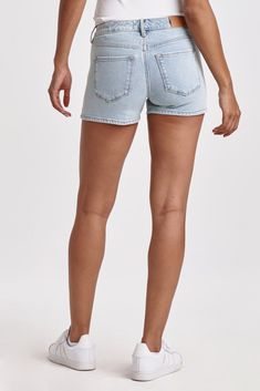 Classic denim mid rise shorts with clean hem. The flirt fit with a wink, sits a touch lower on the waist and playfull hugs every curve from hip and thigh. Shorts inseam on comfort stretch denim accented with designer abstract floral embroidery, in effortless light shade for any outings with buttery softness.9 1/4" Front Rise (include waistband), 22" Leg Opening, 3 1/4" inseam (Size 27) COMFORT STRETCH: Slightly snug, give sometime to ease in, may go up one size 98% COTTON 2% SPANDEX Machine wash Trendy Fitted Cutoff Shorts, Light Wash Cutoff Jean Shorts With Built-in Shorts, Light Wash Cutoff Jean Shorts, Trendy Fitted Jean Shorts, Fitted Shorts With Frayed Hem, Fitted High-waisted Shorts With Frayed Hem, Spring Light Wash Jean Shorts, Trendy Light Wash Short Bottoms, Fitted Medium Wash Shorts