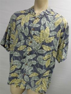 mens TOMMY BAHAMA RELAX gray FLORAL SILK S/S BUTTON UP SHIRT LARGE HAWAIIAN Nice Tommy Bahama Relax yellow and gray floral short sleeve button up shirt. It is a size Large and is silk and is nice and clean.  It has a square tail.  Check out my other auctions for great mens shirts and get combined shipping. Pit to pit across the front-  inches seam to seam across the back-   inches top of collar to bottom hem down the back- inches   Payment can be made via Paypal Only. Shipping is $6 to the Lower Floral Short, Grey Floral, Short Sleeve Button Up, Tommy Bahama, Button Up Shirt, Button Up Shirts, Casual Button Down Shirt, Button Up, Men Casual