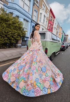 This lehenga set features multi-colored floral embroidery in thread and mirror. This is further highlighted with sequins, beads, and pearls. The skirt is paired with an embroidered strappy blouse.The embroidered dupatta shows multi-colored thread tassels on all four sides.From Seema Gujral's For the love of London collection. DELIVERY TIMEPlease allow 8-12 weeks for your outfit to arrive. FABRIC DETAILSNet Professional cleaning only. Indian Wedding Outfits Guest, Multicolored Lehenga, Pastel Bridal Lehenga, Mendhi Outfit, Modern Lehenga, Strappy Blouse, Thread Tassels, Modern Indian Wedding, Indian Wedding Bride