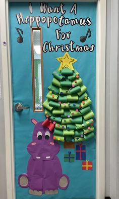 a door decorated to look like a christmas tree with an animal on it and the words, what happens for christmas?