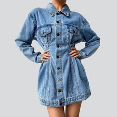 Introducing the 2023 Spring-Summer Collection's Single-breasted Mini Denim Dress ââ‚?a denim dream for the new age!Why You'll Love ItThis 90s-inspired denim dress is a chic blend of everlasting underground and contemporary modern. The stonewashed fabric and unique distressed pattern capture a natural and punkish edge while the sleek slim fit adds refinement. The zippered closure and stylish button duo ensure functionality and flair. making it the perfect day-to-night piece!Distinctive Features: Spring Denim Blue Dress With Buttoned Pockets, Spring Denim Blue Dresses With Buttoned Pockets, Fall Denim Blue Mini Dress With Pockets, Denim Blue Mini Dress With Pockets For Fall, Summer Cotton Denim Dress With Buttoned Pockets, Denim Blue Mini Length Relaxed Fit Denim Dress, Relaxed Fit Mini Length Denim Dress, Denim Blue Relaxed Fit Mini Denim Dress, Light Wash Denim Mini Dress With Pockets