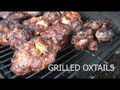 grilled oxtails on the grill with text overlay that reads grilled oxtails