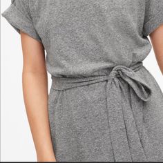 This Cute Grey Gap Dress Is An Easy Piece For Your Closet. Pull Over Knit With A Tie Waist. Great With Sandals Or Tennies. Bust 23" Length 41" (#10 S/S Dress) Casual Gray V-neck Maxi Dress, Casual Crew Neck Midi Dress For Daywear, Casual Cotton Mini Dress With Tie Waist, Gap Short Sleeve Mini Dress, Gap Casual Cotton Midi Dress, Chic Loungewear Dress With Tie Waist, Gap V-neck Daywear Dress, Casual Cotton Mini Dress By Gap, Casual Crew Neck Loungewear Dress