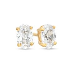 Dainty yet dazzling, these oval lab-created diamond solitaire stud earrings in 14K gold add sparkle to all your favorite looks. Fashioned in 14K gold Each earring showcases a certified oval-shaped lab-created diamond solitaire boasting a color rank of F and clarity of Si2. This 1/2 ct. t.w. lab-created diamond design arrives with a certification card. These post earrings secure comfortably with screw backs. 14k Gold Oval Earrings With Brilliant Cut, Yellow Gold Oval Earrings, Ethical 14k Gold Oval Earrings, Solitaire Studs, Diamond Design, Lab Created Diamonds, Diamond Earrings Studs, Diamond Studs, Diamond Solitaire