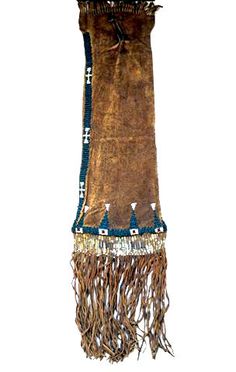 a brown scarf with fringes hanging from it