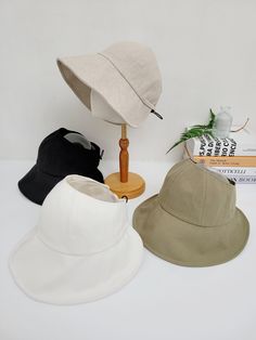 - 60% Linen, 40% Cotton - Adjustable Back Elastic with Stopper - Lightweight, Breathable -Ponytail Hat - Foldable/Packable Trendy Cap-style Sun Hat, Trendy Solid Color Sun Hat Cap, Adjustable Khaki Baseball Cap For Beach, Adjustable Khaki Baseball Cap For The Beach, Khaki Bucket Hat For Spring, Trendy Adjustable Khaki Hat, Casual Lightweight Visor Bucket Hat, Casual Lightweight Khaki Hat, Solid Color Brimmed Baseball Cap For Outdoor