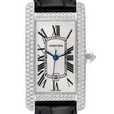 Cartier Tank Americaine White Gold Diamond Ladies Watch 2490. Automatic self-winding movement. 18K white gold case 22.0 x 41.0 mm. Octogonal crown set with an original Cartier factory diamond. Original Cartier factory double-row diamonds lug to lug. 18k white gold bezel with original Cartier factory double-row diamonds. Scratch resistant sapphire crystal. Silvered guilloche dial with black Roman numerals. Blued steel sword shaped hands. Secret Cartier signature at VII. Date window at 6 o'clock. Cartier Diamond Watch With Brilliant Cut, Classic Diamond Watch With Palladium Hardware, Timeless Cartier Diamond Watch With Palladium Hardware, Classic Platinum Diamond Watch With Diamond Hour Markers, Cartier White Gold Watch With Brilliant Cut, Cartier Diamond Watch With Diamond Hour Markers For Anniversary, Timeless Cartier Diamond Watch In Platinum, Cartier Silver Diamond Watch With Brilliant Cut, Cartier Diamond Watch In Silver