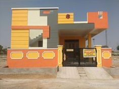 an orange and yellow building with stairs leading up to it