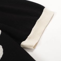 - Knitted Polo- 100% cotton yarn- Unlined- Regular fit- Machine washable Fabric & Care- Delicate Machine Wash at 30 degrees(86℉) with similar colors.- Iron inside out on low temperature.- Store flat.- Do not tumble dry.- Do not bleach. Black Cotton Sweater With Ribbed Collar, Black Cotton Knit Sweater, Black Jacquard Knit Crew Neck Top, Black Jacquard Knit Tops For Winter, Black Jacquard Knit Long Sleeve Top, Black Fitted Cotton Sweater, Fitted Black Cotton Sweater, Black Knit Crew Neck Top, Black Short Sleeve Sweater For Spring