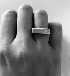 The Silver Ring and Diamond, is a one off design. Ring Weight: 8g Modern Diamond Signet Ring, Modernist White Gold Diamond Jewelry, Minimalist Diamond Signet Ring With Polished Finish, Minimalist Silver Rings With Single Cut Diamonds, Modern White Gold Rings With Single Cut Diamonds, Minimalist Signet Ring With Single Cut Diamonds, Minimalist Diamond Rings With Polished Finish, Modern Signet Ring With Single Diamond In Open Style, Modern Sterling Silver Jewelry With Single Diamond