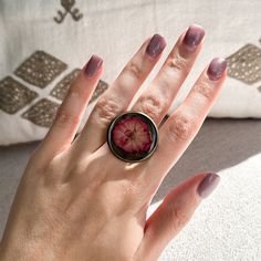 This ring is handcrafted with care, ensuring that the real pressed flowers are arranged in a stunning and unique design. Each ring has its own elaborate combination of flowers, making it a one-of-a-kind piece of art.  This Flower Ring is a beautiful reminder to embrace and appreciate the beauty that surrounds us. This botanical resin ring is perfect for any occasion- whether you are celebrating a special milestone or just want to treat yourself to a breathtaking work of art.  Our ring is designed to comfortably fit any finger size, allowing you to bring a touch of nature's magic with you wherever you go. Its lightweight and delicate construction add to its effortless charm, making it perfect for daily wear or special occasions.  This Real Flower Ring is the perfect way to show your appreci Nature-inspired Rose Gold Flower Ring As Gift, Vintage Birth Flower Rings For Gifts, Vintage Birth Flower Rings For Gift, Birth Flower Open Ring Jewelry Gift, Nature-inspired Flower Shaped Ring As A Gift, Botanical Flower Jewelry With Natural Inclusions, Bohemian Rose Gold Rings For Gift, Bohemian Rose Gold Rings As Gift, Rose Gold Rings With Birth Flower