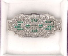 "Fabulous Antique Art Deco Diamond Platinum Brooch Pin with genuine diamonds and genuine emeralds All Original ! 5 carats of GH VS2 old cut diamonds with the center Old Minor between 2.25-2.50 H I Vs2 Super high end piece Measures 2 1/4\" by 1 1/8\" Weighs 15.1 grams Spectacular..." Emerald Brooch, Platinum Diamond Wedding Band, Engagement Ring Photos, Platinum Diamond Engagement Rings, Buy Jewellery Online, Morganite Engagement, East Hampton, Art Deco Diamond, Antique Art Deco