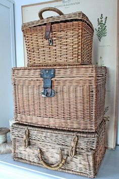 two wicker baskets stacked on top of each other