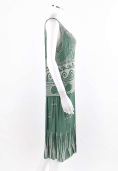 For Sale on 1stDibs - MADELEINE VIONNET c.1924 “Little Horses” Soft Green White Glass Beaded Flapper Dress Circa: 1924 Designer: Madeleine Vionnet Style: Flapper drop waist Madame Vionnet, 1920 Dress, 1920s Women, Madeleine Vionnet, Beaded Flapper Dress, Horse Dress, 1920 Fashion, 30s Fashion, 1920s Dress