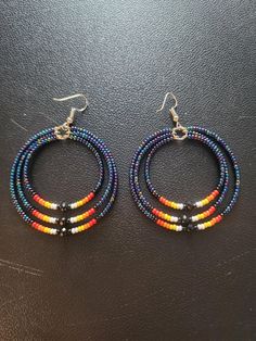 Beaded Hoop Earrings.  #10 Czech beads.  2" in diameter. Adjustable Small Hoop Earrings With Dangling Beads, Adjustable Beaded Dangle Hoop Earrings, Adjustable Hoop Beaded Earrings With Colorful Beads, Adjustable Hoop Beaded Earrings With Dangling Beads, Adjustable Hoop Earrings With Colorful Beads, Adjustable Hoop Earrings With Dangling Beads, Adjustable Colorful Beaded Circle Hoop Earrings, Adjustable Beaded Hoop Earrings, Adjustable Colorful Beaded Round Earrings