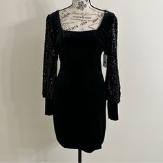 Midnight Doll Black Cocktail Dress Women's Size M-Velvet And Sequin-Stretch Pit To Pit 17 Inches Length 33 Inches Waist 26 Inches Black Velvet Dress For Date Night, Black Velvet Dress For Party Season, Black Velvet Evening Dress For Fall, Fitted Velvet Dress For Holiday Date Night, Fitted Velvet Dress For Date Night Holiday, Black Velvet Long Sleeve Dress For Night Out, Black Velvet Cocktail Dress For Winter, Black Velvet Evening Dress For Winter, Black Velvet Dress For Winter Evening