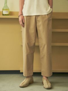 Editor's NoteHALBKREIS LAYOUT's wide pants is made out of soft and wrinkle resistant cotton blend fabric that is processed for minimum distortion. With a wide but straight fit, it is casual but still has a refined mood. It has a design point of seam line on the knee. Style it with various items during spring and summer for comfortable look. - Seamline on the front knee- Wide straight silhouette- Pin tuck on the front- Back patch pocketsMeasurements (in.)S/M/L- Length: 37.40 in. / 37.80 in. / 38.19 in.- Waist: 15.55 in. / 16.34 in. / 17.13 in.- Thigh: 14.96 in. / 15.35 in. / 15.75 in.- Rise: 12.60 in. / 12.99 in. / 13.39 in.- Hem: 8.86 in. / 9.06 in. / 9.25 in.Model info: Height - 6'1, Weight: 150 lbs, Wearing size MComposition & Care- Cotton 67% Polyester 33%- Dry clean recom Relaxed Fit Wide-leg Chinos For Business Casual, Business Casual Wide-leg Chinos With Relaxed Fit, Business Casual Wide-leg Relaxed Fit Chinos, Business Casual Relaxed Fit Wide-leg Chinos, Solid Wide-leg Cotton Chinos, Solid Cotton Wide-leg Chinos, Beige Ankle-length Cargo Pants For Work, Cream Casual Pants For Business Casual, Casual Cream Pants For Business Casual