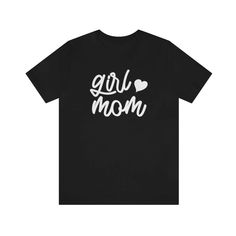 This simple yet stylish girl mom shirt is the perfect addition to any mom of girls wardrobe! Makes a great Mother's Day or birthday gift for mom too. This classic unisex jersey short sleeve tee fits like a well-loved favorite. Soft cotton and quality print make users fall in love with it over and over again. These t-shirts have-ribbed knit collars to bolster shaping. The shoulders have taping for better fit over time. Dual side seams hold the garment's shape for longer. Trendy Tops With Funny Text For Mother's Day, Trendy Tops For Mother's Day Gift, Mother's Day Graphic Tee T-shirt, Cotton T-shirt With Letter Print For Mother's Day, Trendy Short Sleeve Shirt For Mother's Day, Trendy Relaxed Fit T-shirt For Mother's Day, Casual Family T-shirt For Spring, Mother's Day Pre-shrunk Cotton T-shirt, Mother's Day Short Sleeve Relaxed Fit T-shirt