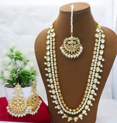 Kundan Bridal Choker Necklace Earrings Tikka Set, Long Necklace Rani Haar Pearls Bollywood Jewellery Set, Party Wear Necklace, Statement Set ITEM DESCRIPTION Metal = Gold Plated Occasion = Wedding, Party Wear, Bridal Color = White and Yellow Long Necklace = 13 Inches Long ( Adjustable String/Dori), Earring Size = 3.5 Inches Long, tikka - 6 Inches Long Free Shipping Punjabi Jewelry Traditional Necklace, Rani Har, Tika Jewelry, Purple Choker, String Earrings, Kundan Jewellery Bridal, Jewelry Sets Handmade, Rani Haar, Bridal Choker