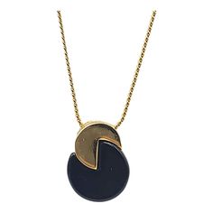 "Trifari Gold Tone Black Acrylic Interlocked Pacman Circle Pendant Necklace Vintage Chain: 18\" Pendant: 0.75\" x 0.5\" Features: * Pendant * Made in United States Size: Womens One Size Condition: Pre-Owned Good Gently Used - see all pics for condition" Black Pendant Necklace With Chain, Elegant Black Pendant Locket Necklace, Black Round Chain Necklace, Black Metal Necklace With Locket, Black Clavicle Chain Charm Necklace, Black Metal Pendant Charm Necklace, Formal Black Locket Necklace, Black Pendant Charm Necklace With Chain, Formal Black Enamel Round Pendant Necklace