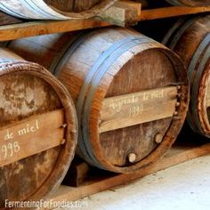 several wooden barrels stacked on top of each other