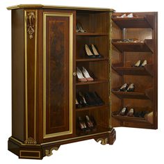 an armoire with many pairs of shoes in it