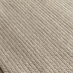 a close up view of a rug on the floor with no carpeting or furniture