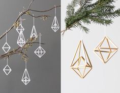 three different ornaments hanging from a tree next to a branch with some branches in it