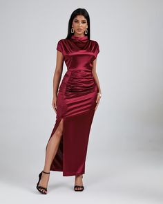 Feel like a total queen in this regal Burgundy High Neck Split Maxi Dress! Flattering on any body type, you'll love its silky fabric and beautiful deep hue. Stylish split detailing and a high neckline make for a swoon-worthy look. Ready to be the belle of the ball? Get this dress today! Our Style No.ZZC Height - 66.9"/170cm Bust - 33.8"/86cm Waist - 24.4"/62cm Hips - 36.2"/92cm and wears size S About Wholesale/Dropshipping, please contact us! Note: Colour may vary due to lighting on images. The Evening Satin High Neck Maxi Dress, High Neck Satin Maxi Dress For Party, High Neck Satin Dress For Date Night, High Neck Satin Evening Dress, Satin High Neck Dress For Date Night, Solid Ruched High Neck Dress, High Neck Satin Dress For Formal Occasions, Elegant Satin Dress With High Neck, Formal High Neck Satin Dress