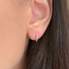 These Thin Diamond Huggie Earrings in 14k Gold are the perfect everyday staple. They are delicate, timeless, and have the right amount of sparkle. They are set with mini diamonds. Dress them up or down for any occasion! Diamonds (0.060 ct) 14k yellow, rose, or white gold Outside diameter: 10mm Width: 1mm Please allow up to 6 weeks for production.KAMARIA supports survivors of power-inequality violence through their 501(c)(3) nonprofit Restore Dignity. Everyday Diamond Earrings, Tiny Diamond Earrings, Diamonds Dress, Boulder Opal Necklace, Simple Gold Earrings, Diamond Huggie Earrings, Diamond Huggies, Western Earrings, Mini Earrings