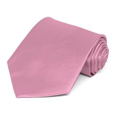 This antique pink tie has a soft, silky feel. The durable material makes it great for everyday wear and the satin shine is a top pick for group or formal wear. Standard men's 3.5-inch width. Part of our exclusive Alexander Logan Neckwear® collection. We recommend this shade for a muted medium pink color. Product Features • Traditional 3.5" width, at the widest point • 57" length, tip to tip• Color is antique pink • Made from 100% Polyester • Satin finish • Dry clean only • Imported Turquoise Suit, Pink Ties, Pink Solid, Pink Tie, Wedding Ties, Antique Pink, Tie Styles, Matching Accessories, Popular Wedding