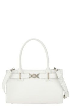 A gleaming Medusa medallion anchors the belted topline of this elongated tote equipped with carry handles and a removable strap. Magnetic-snap closure Top carry handles; removable strap Interior wall pockets Leather Made in Italy Designer Handbags White Satchel With Silver-tone Hardware For Formal Occasions, White Formal Satchel With Silver-tone Hardware, Modern White Satchel With Palladium Hardware, Formal White Satchel With Palladium Hardware, Classic Silver Bags With Gold-tone Hardware, Luxury White Satchel With Silver-tone Hardware, Elegant Satchel With Silver-tone Hardware, Elegant Satchel With Silver-tone Hardware And Double Handle, Chic White Satchel With Palladium Hardware