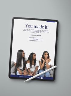 a tablet with an ad on it that says you made it, and three women sitting together