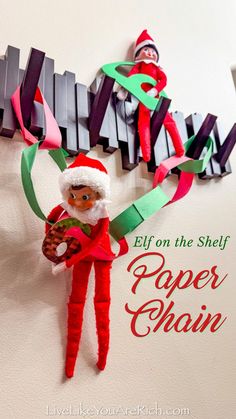 Paper Chain Christmas Countdown. Our elves are excited we have less than a week left until Christmas. They are reminding of us of our Christmas Countdown by being next to and in our paper chain.