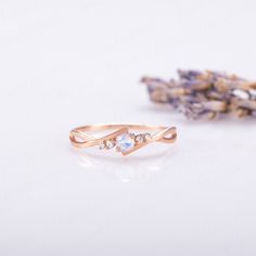 Minimalist celtic style 14k rose gold moonstone promise ring gift for her, Unique tiny moonstone engagement ring, Women gift moonstone ring WE OFFER UNLIMITED PERIOD INSTALLMENTS PLAN This is a beautiful, stunning, feminine ring that works well for all occasions, styles, and ages. You will love it! Ring information: Main stone: Moonstone Approximate size: 3.0mm (1 stone) Accent stones: White cubic zirconia Approximate size: 1.5mm (2 stones) Approximate size: 1.25mm (2 stones) Metal type: Rose Go Dainty Moonstone Promise Ring, Dainty Moonstone Ring With Diamond, Dainty Moonstone Diamond Ring, Rose Gold Moonstone Jewelry With Birthstone, 14k Gold Minimalist Moonstone Promise Ring, Dainty Round Cut Moonstone Ring Gift, Delicate 14k Gold Moonstone Promise Ring, Dainty 14k Gold Moonstone Promise Ring, Delicate Round Moonstone Promise Ring