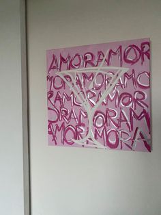 a painting on the wall with words written in it