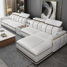 a modern living room with white leather furniture